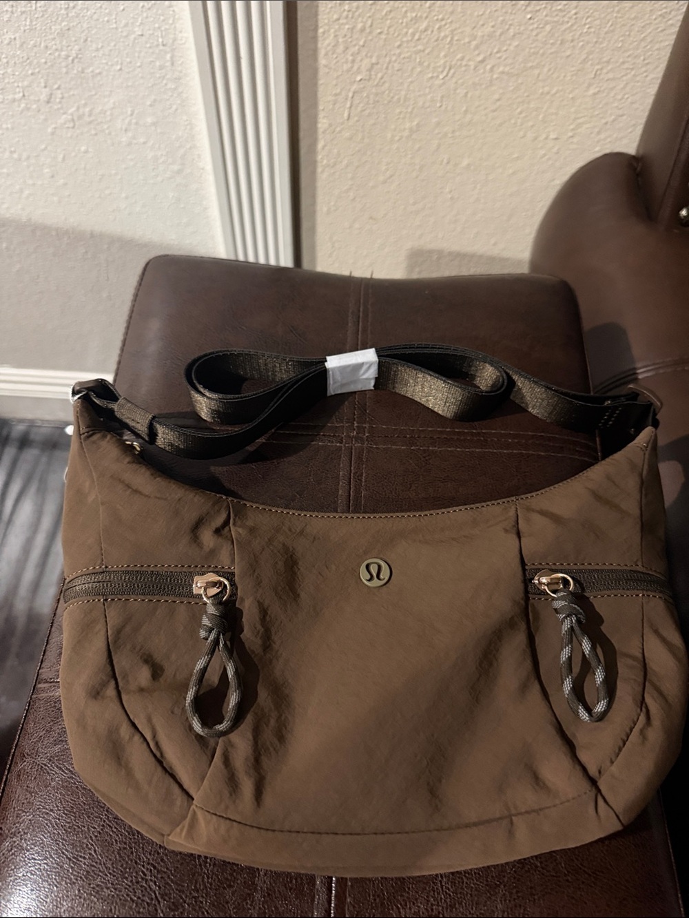 lululemon athletica small slouchy sling bag 3L walnut/gold